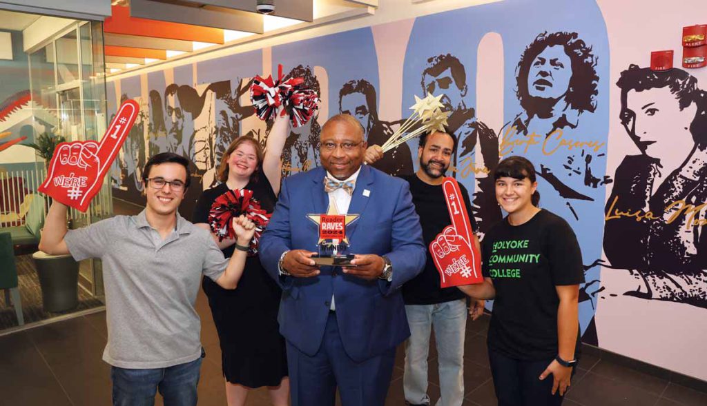 President Timmons and students celebrate HCC’s 2024 Reader Raves award as the best college in western Massachusetts.