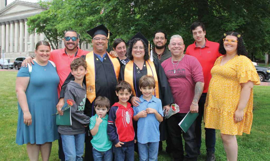 The Antonmarchis gather for a family photo after Commencement 2023