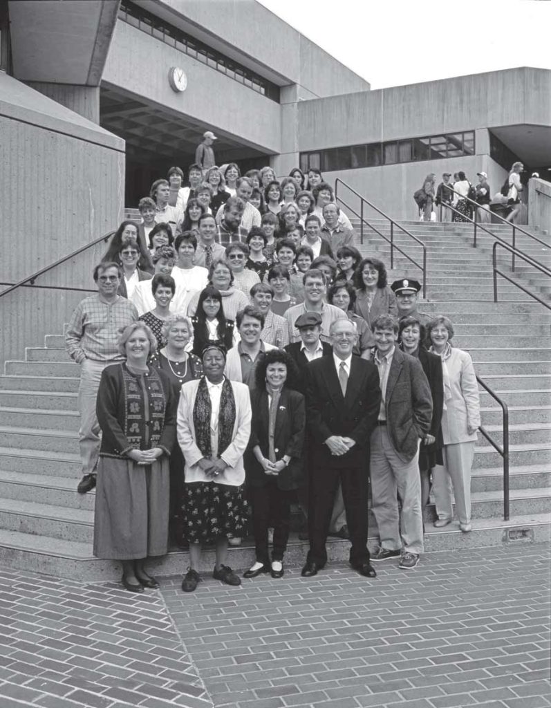 President David Bartley, center right, with HCC faculty and staff