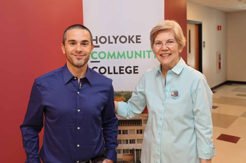 Jeffery Anderson-Burgos ’15 visits with U.S. Sen. Elizabeth Warren before a town hall forum at HCC.