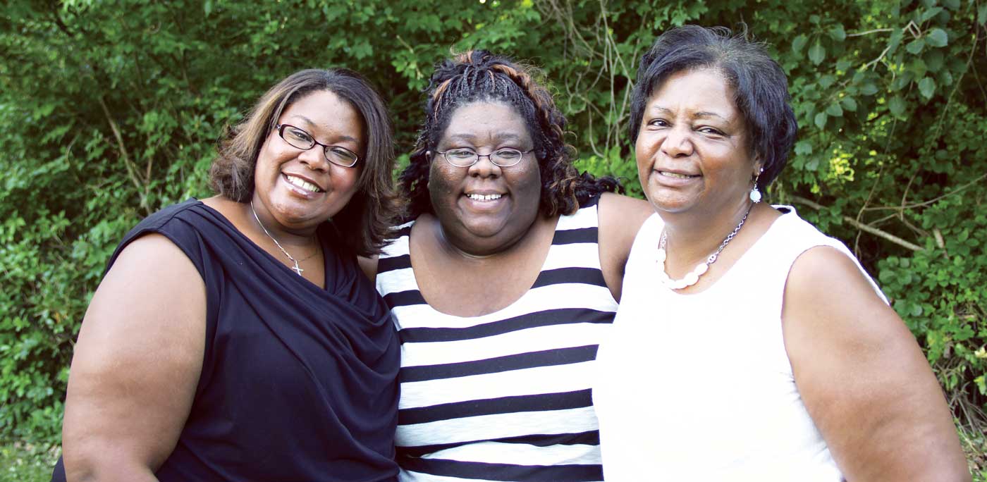 From right, Gertrude ‘Trudy’ Monson ’97 with daughters Kim ’01 and Sarah ’03