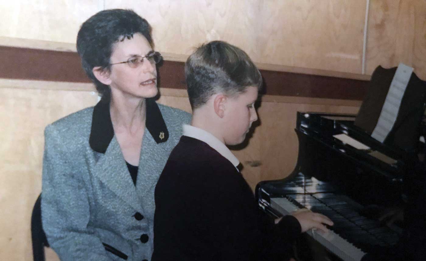 Marie Proulx Meder ’72 teaching piano