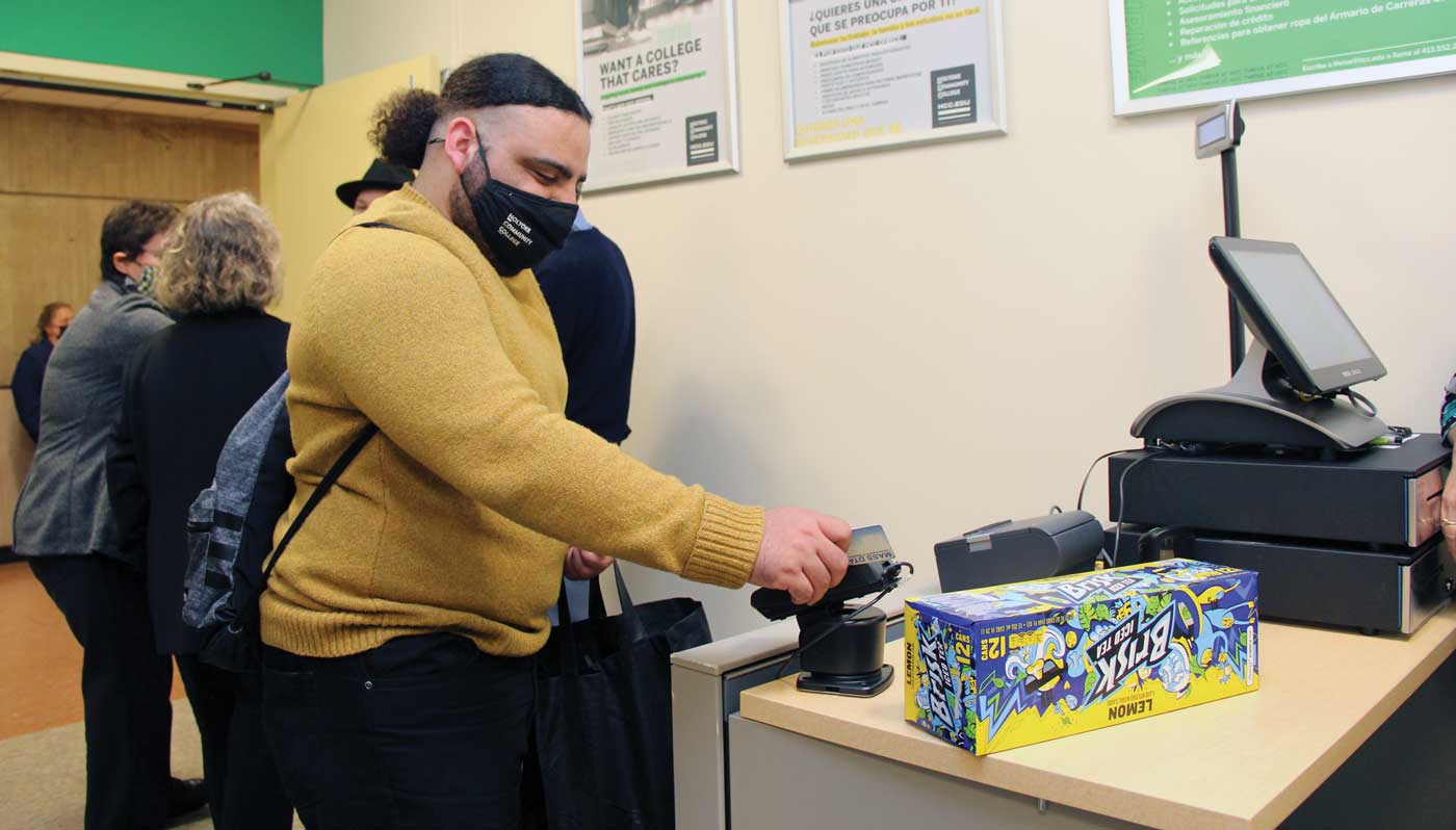 HCC student Luis Pinto-Jimenez picks up some refreshments at HCC’s Homestead Market.