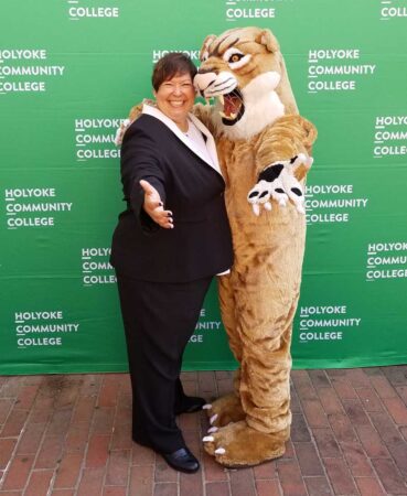 September 2017: President Royal makes a new friend at the Welcome Back BBQ.