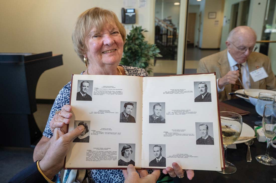 Peg (Laframboise) Wendlandt ’58 holds her college yearbook.