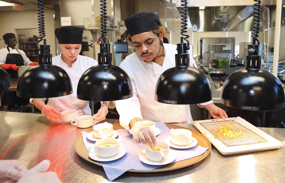 HCC student Gabriel Linares works in the kitchen at the HCC MGM Culinary Arts Institute.