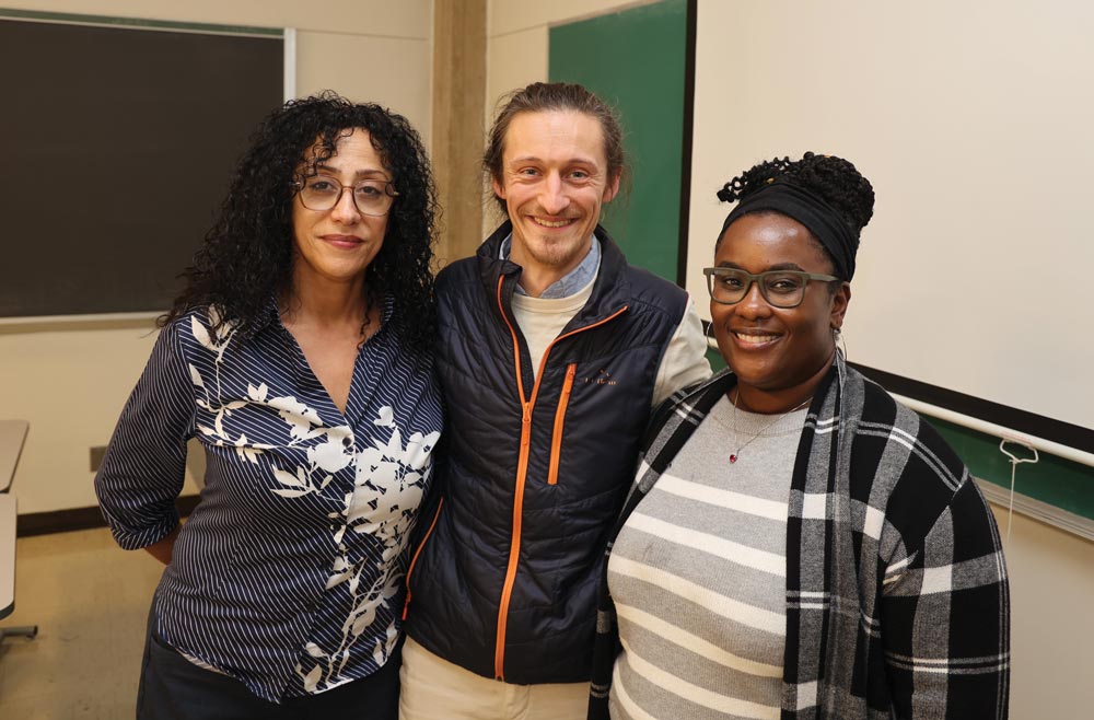 Benjamin Keil ’24, center, visits the HCC campus.