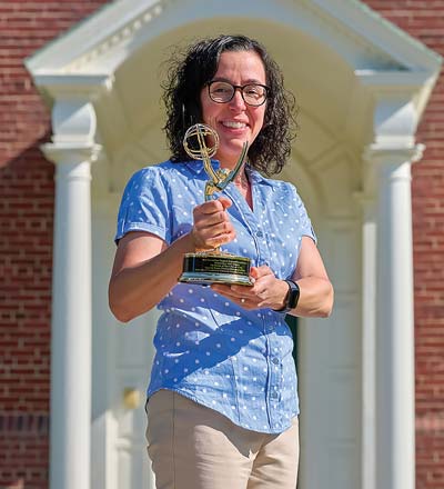 Angelina Reyes holds her Emmy.