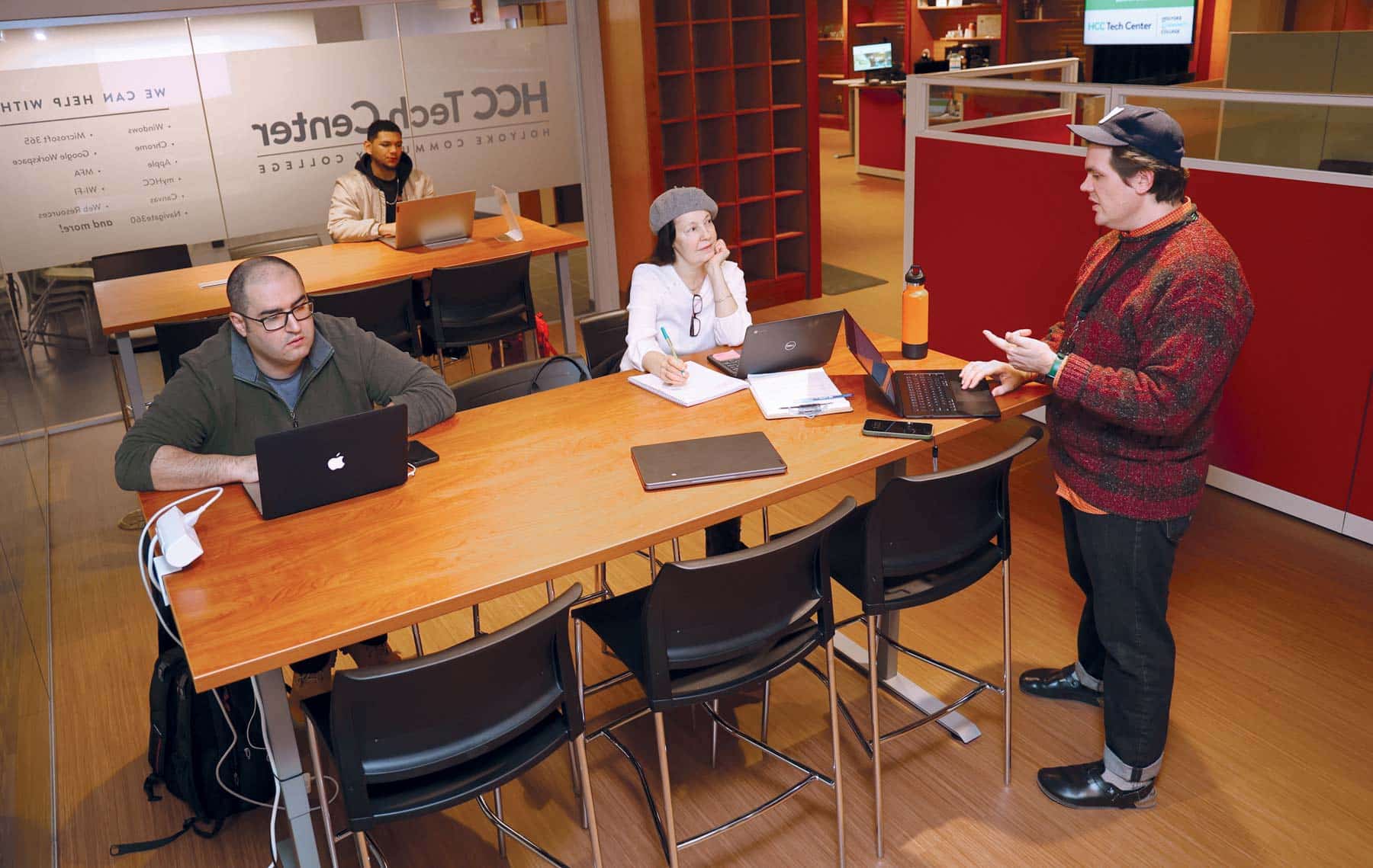 HCC Tech Center manager Walter Pfau, right, leads a workshop in the new HCC Tech Center.